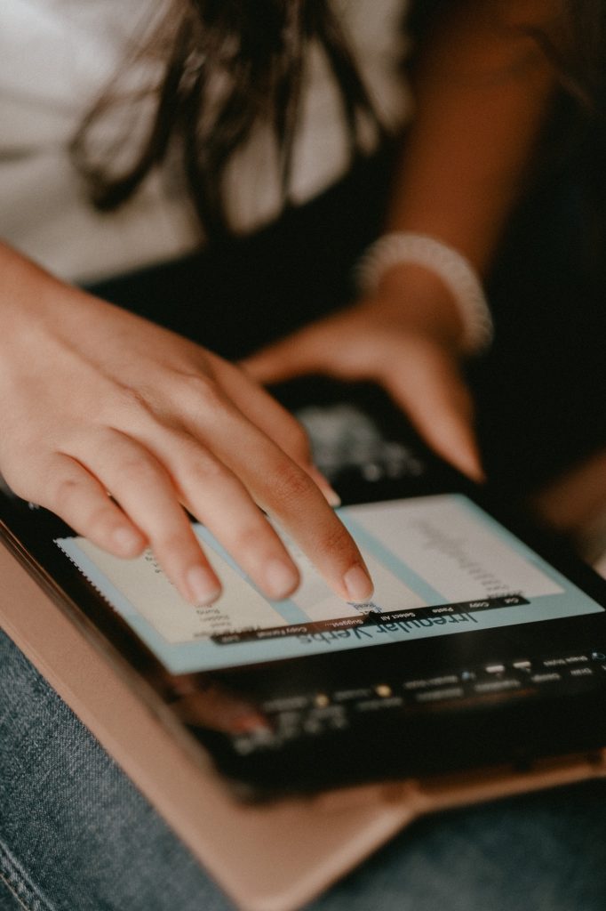 Focused Girl Using a Tablet