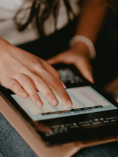 Focused Girl Using a Tablet